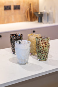 Clear and beige decorative drinking glass