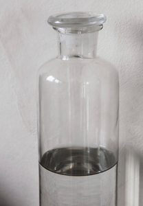 Glass bottle with lid