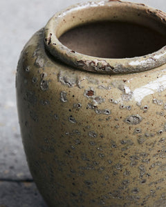 Pale green/beige glazed earthenware vase