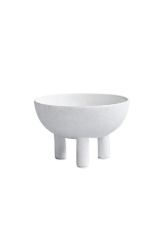 White bowl on legs
