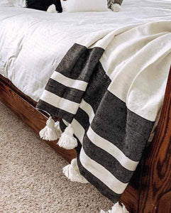 Moroccan striped cotton blanket with tassles black/natural 150x250